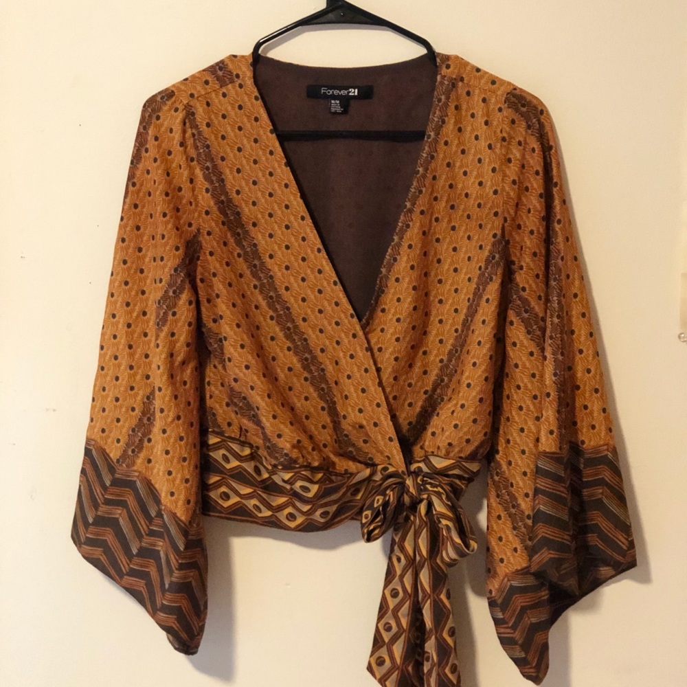 Patterned wrap top with bell sleeves